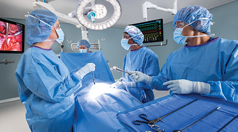 Surgeons performing operation